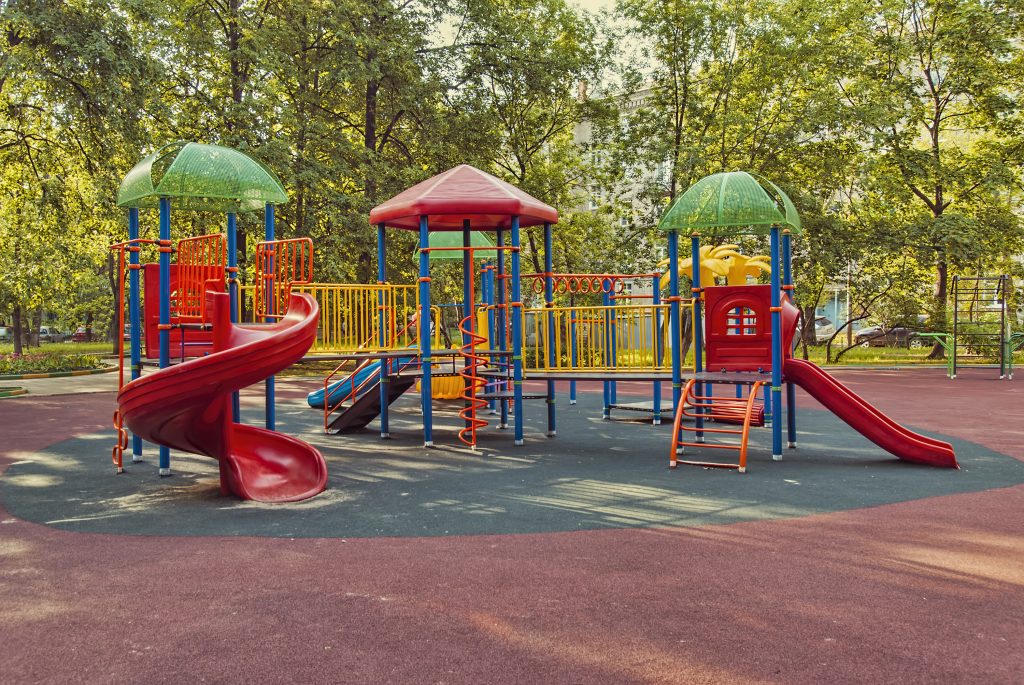 A large playground structure with several slides